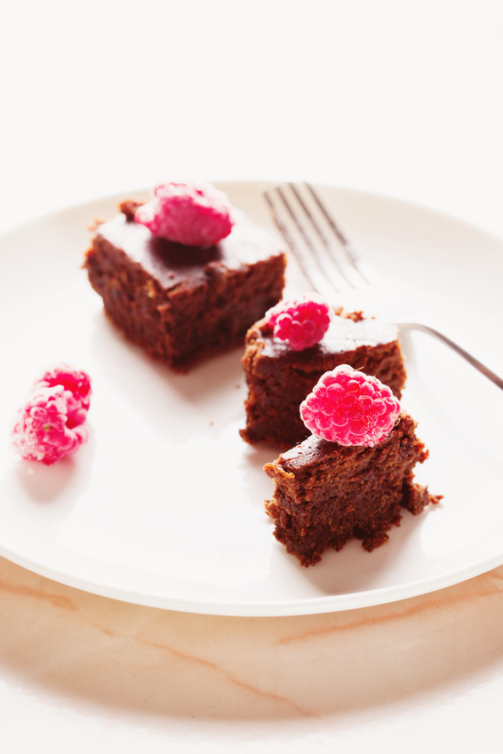 Delicious Chocolate Brownies with raspberry selective focus